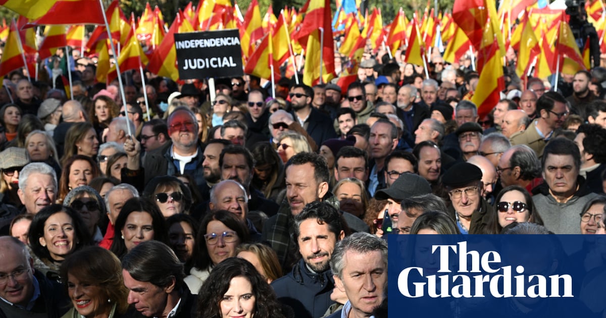 Thousands rally in Madrid to demand snap election over corruption allegations