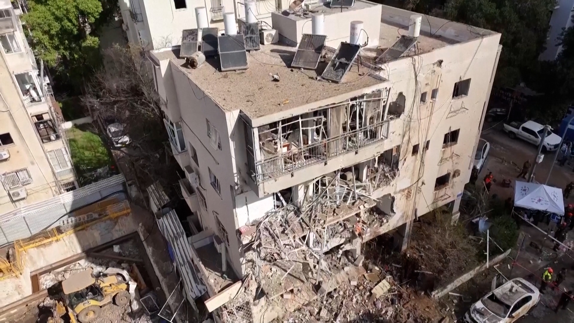 Drone footage shows aftermath of Iranian missile attack in Tel Aviv