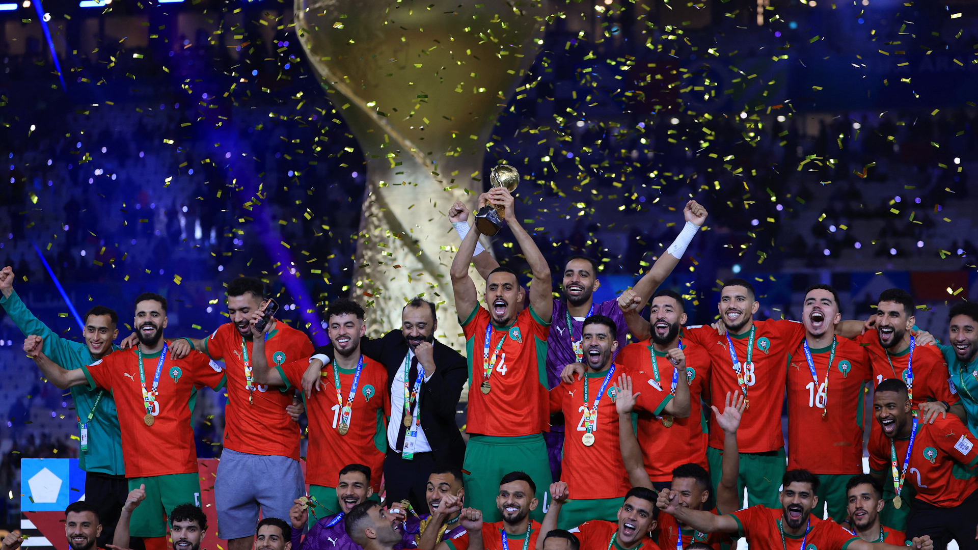Morocco players and fans celebrate winning Arab Cup