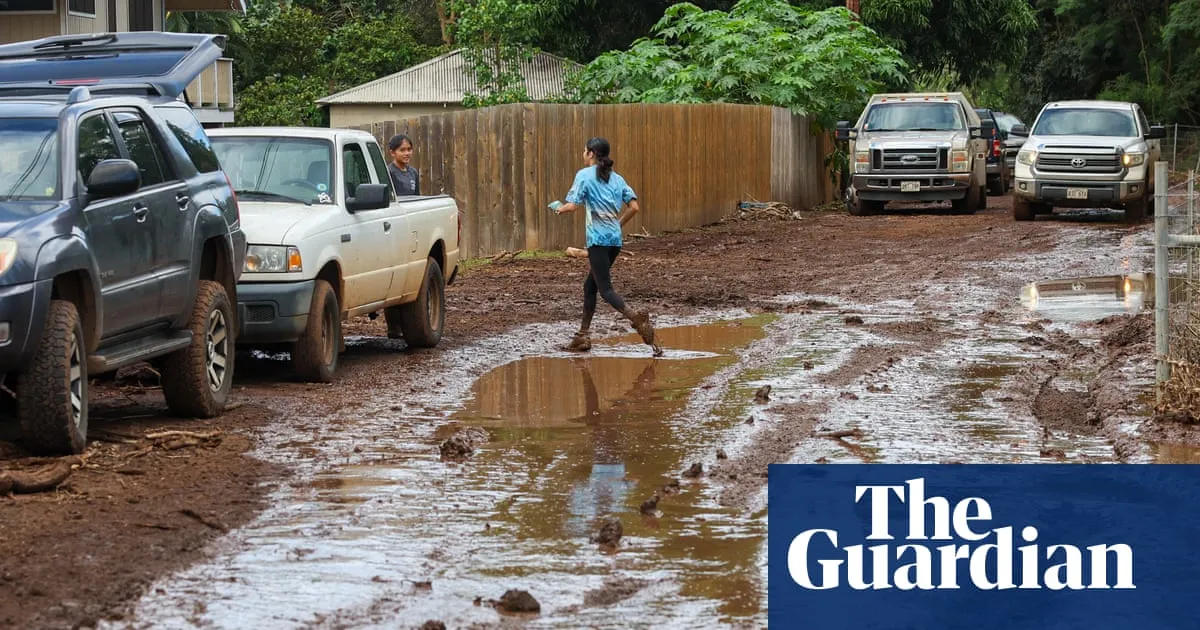 Red volcanic mud coats homes after Hawaii’s worst floods in 20 years