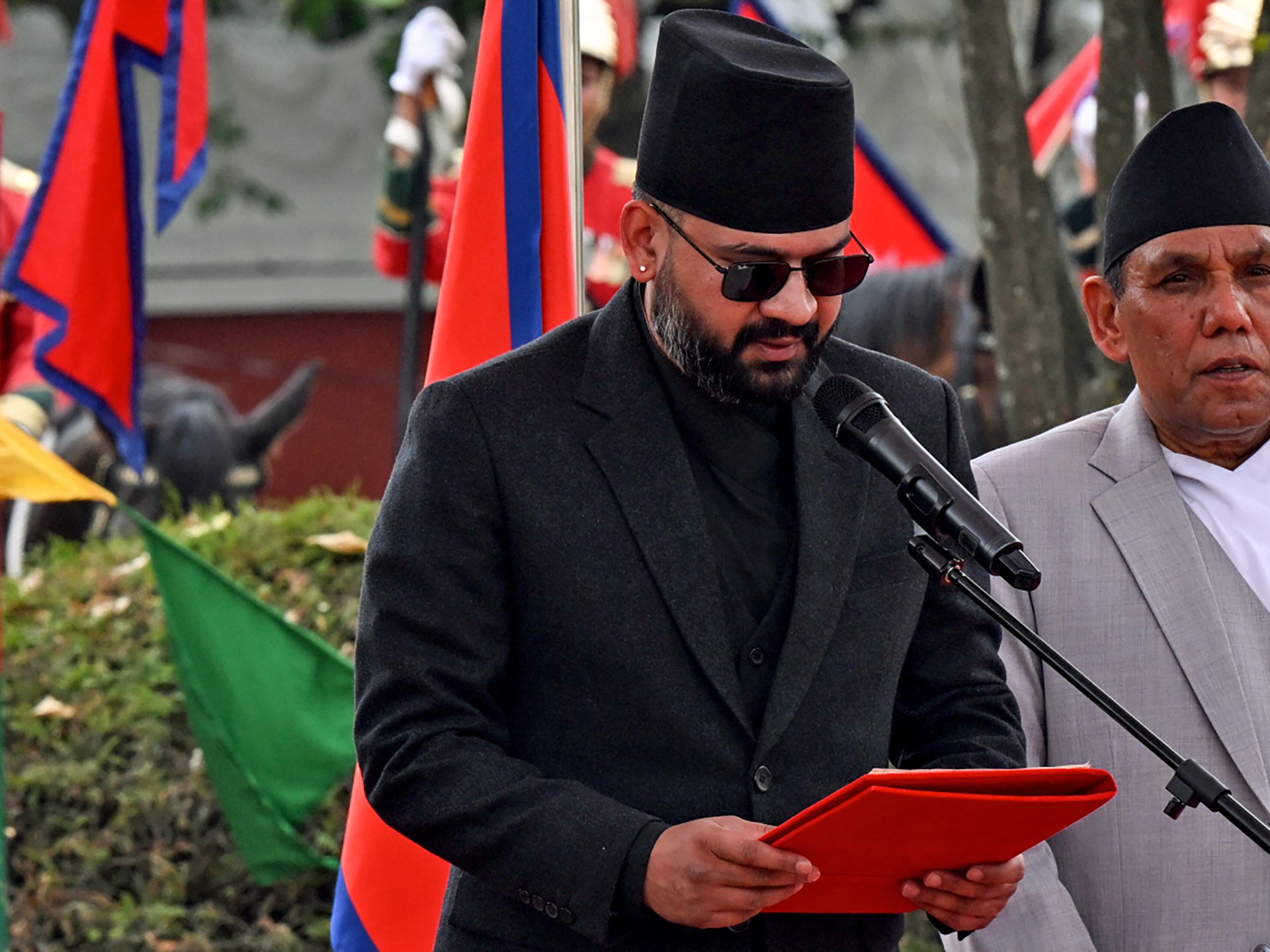 Nepal’s youngest premier sworn in after releasing new rap song about unity