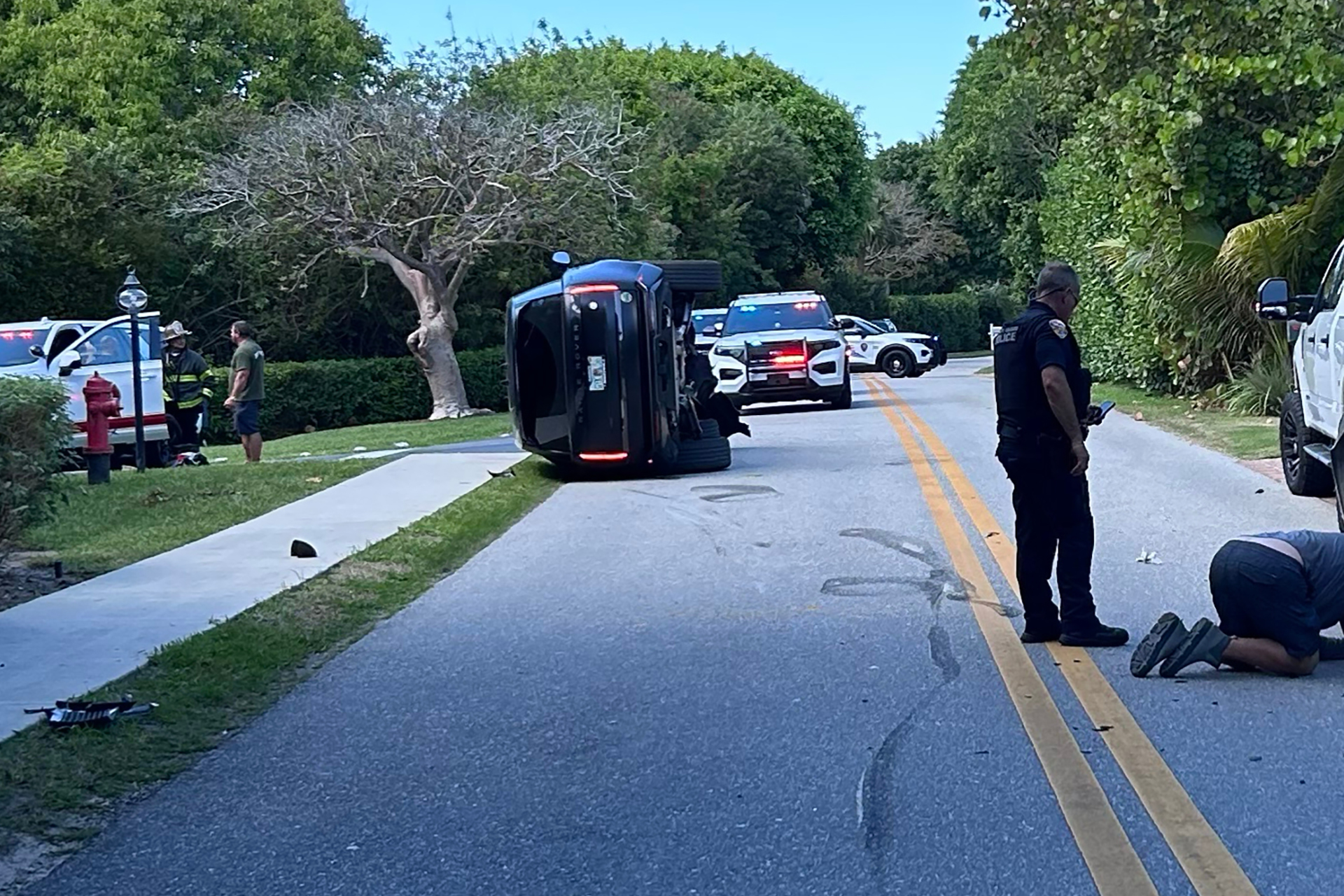 Tiger Woods arrested for suspected DUI after rolling his car