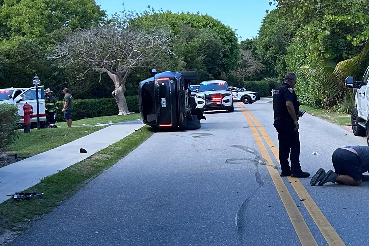 Tiger Woods arrested for suspected DUI after rolling his car
