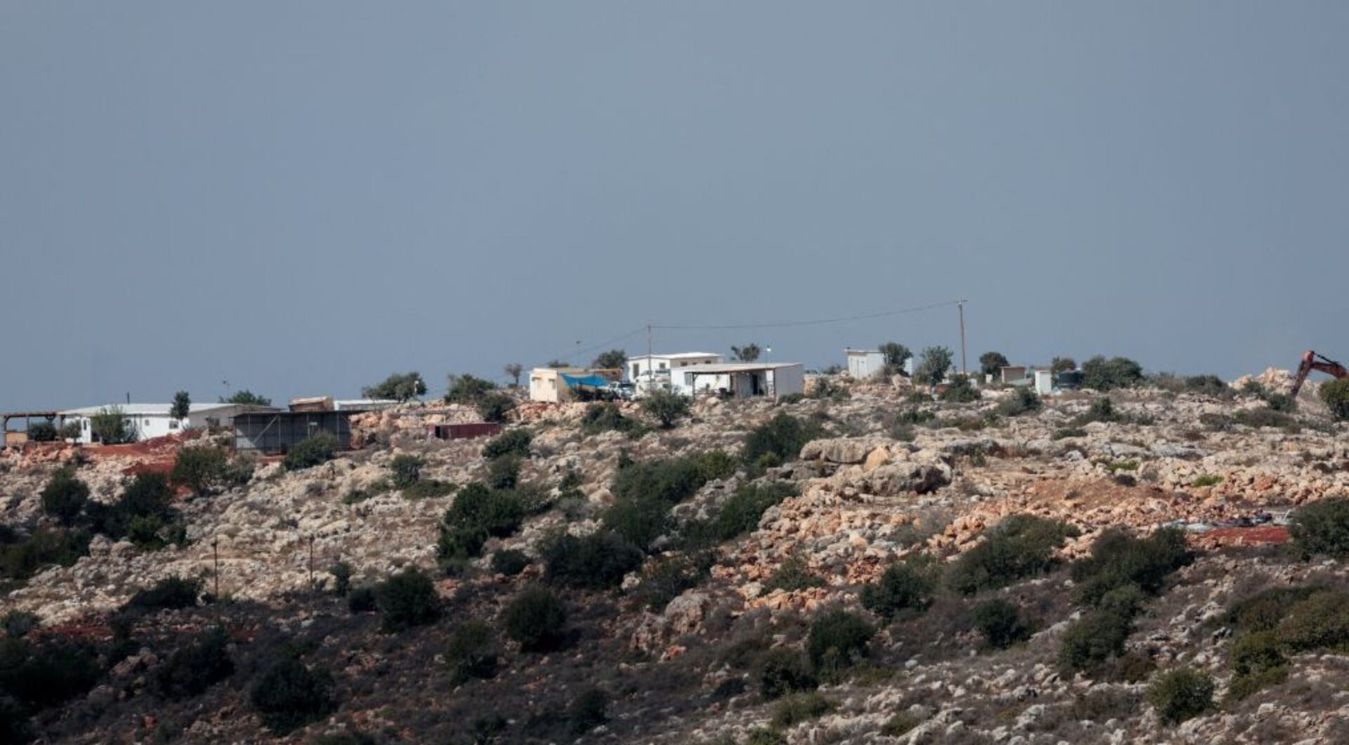 What are the consequences of Israel’s expanding illegal settlements?
