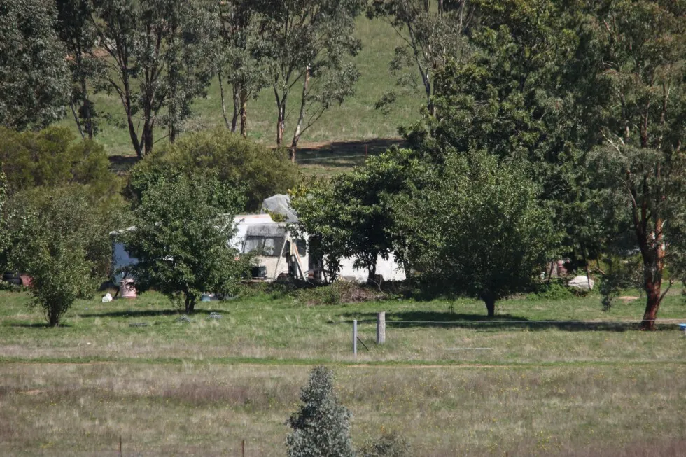 Australian police fatally shoot a suspect in a 3-hour standoff after 2 officers killed