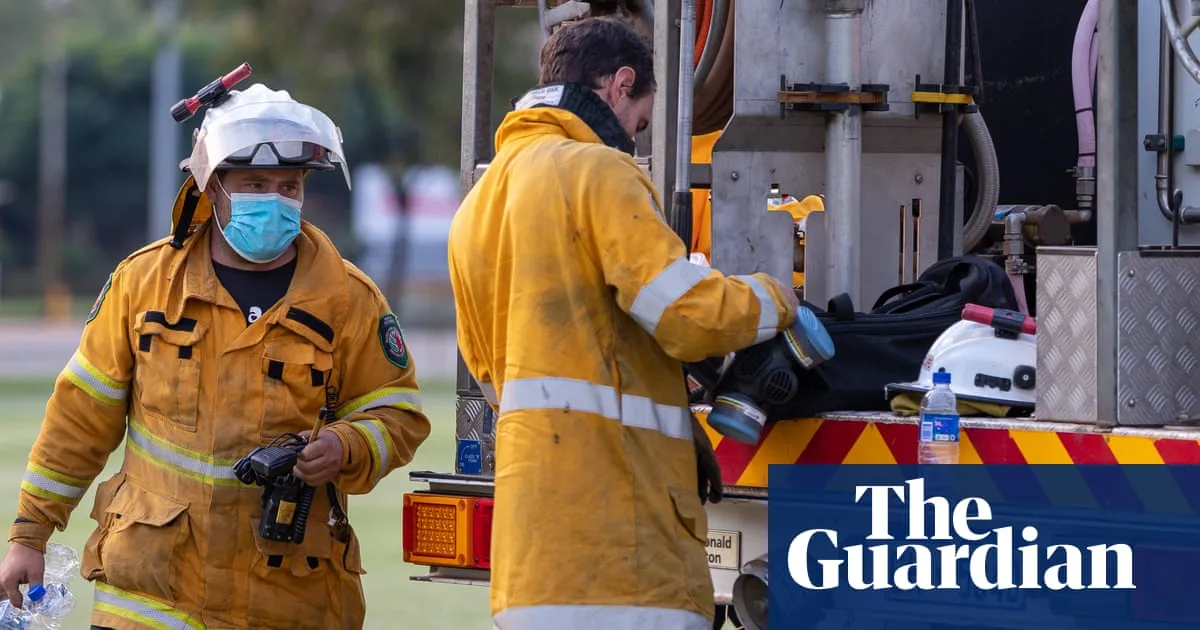 Homes threatened as bushfire rages south-east of Perth and storms hit Queensland and Northern Territory