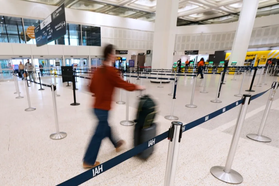 Some wait times at airport bottlenecks are easing with TSA paychecks promised