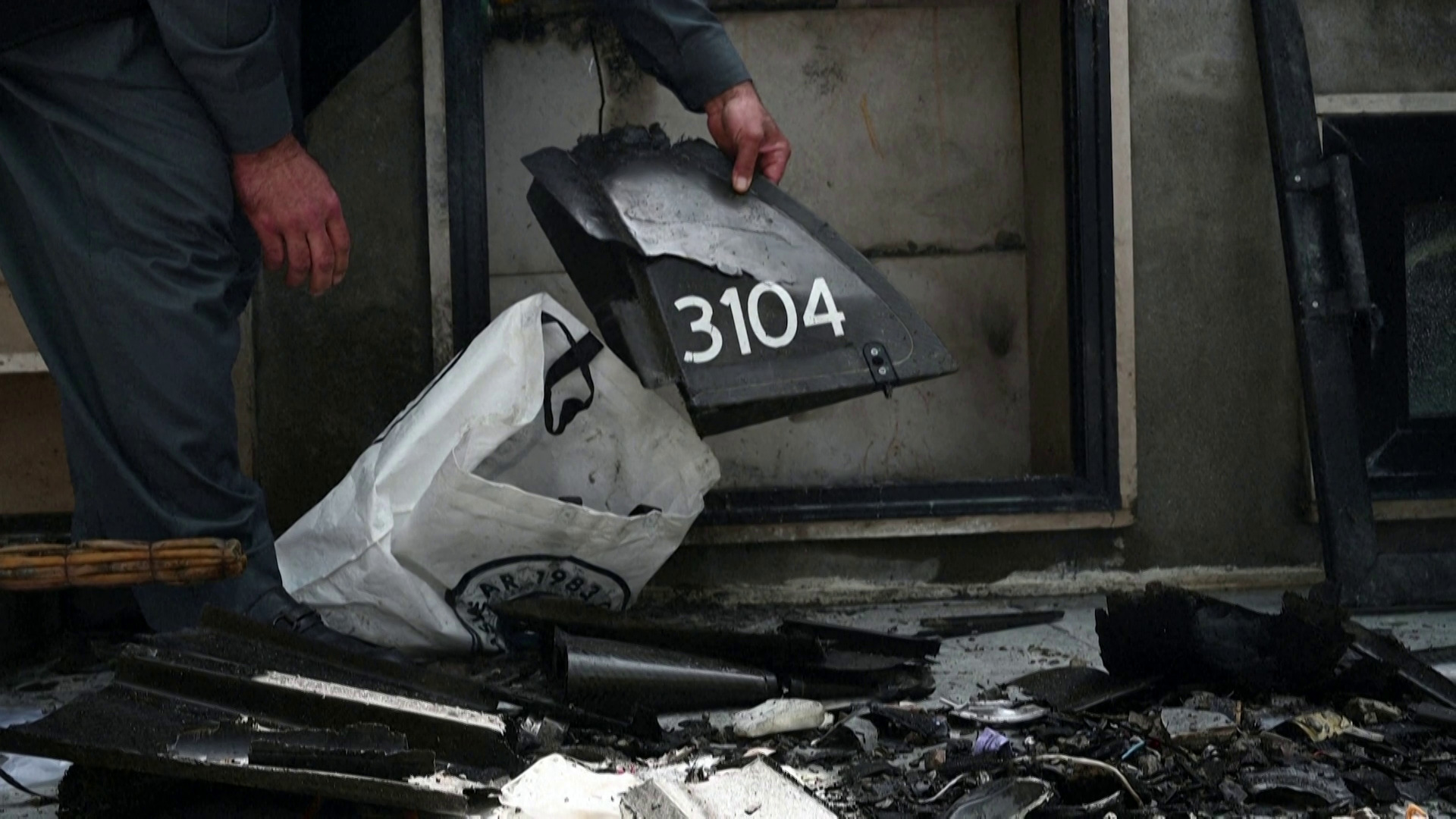 Residents inspect drone damage near Erbil airport