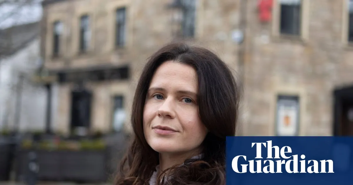 Royal Navy captain steps back from duties over link to MP whose husband faces China spy claims