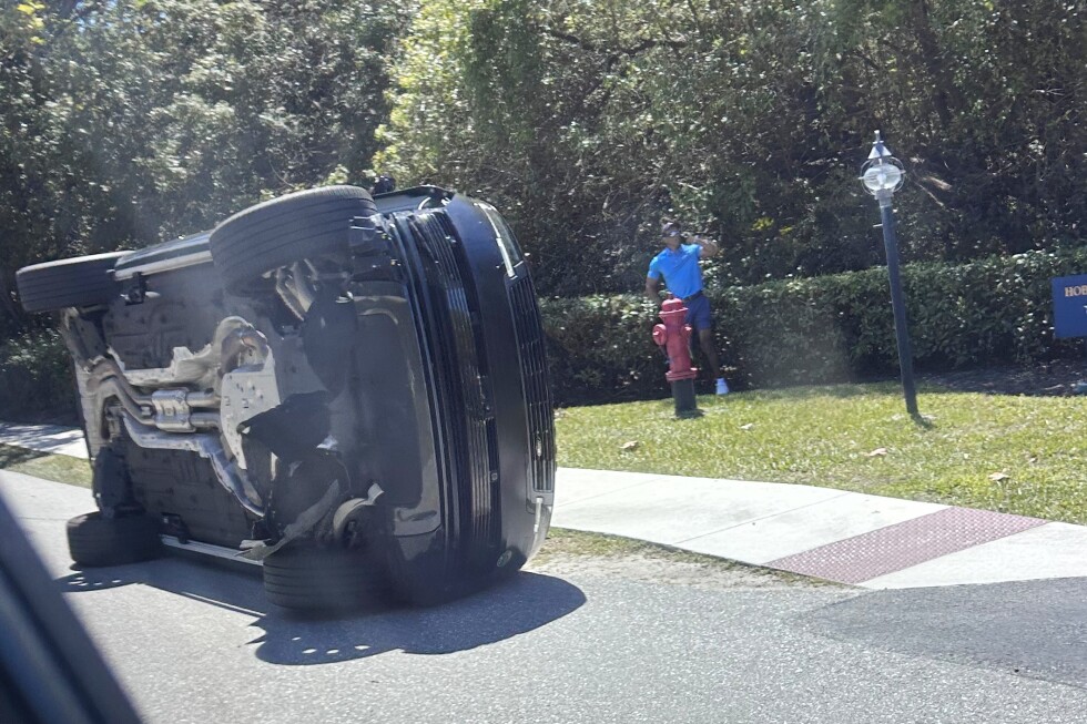 Bodycam shows a stunned Tiger Woods handcuffed after a Florida rollover crash