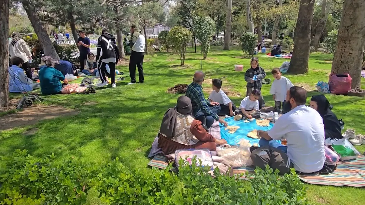 Iranians celebrate New Year in parks despite ongoing attacks