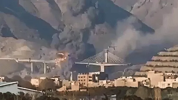 Iran's tallest bridge collapses after reported US airstrikes; Iran threatens American allies in retaliation
