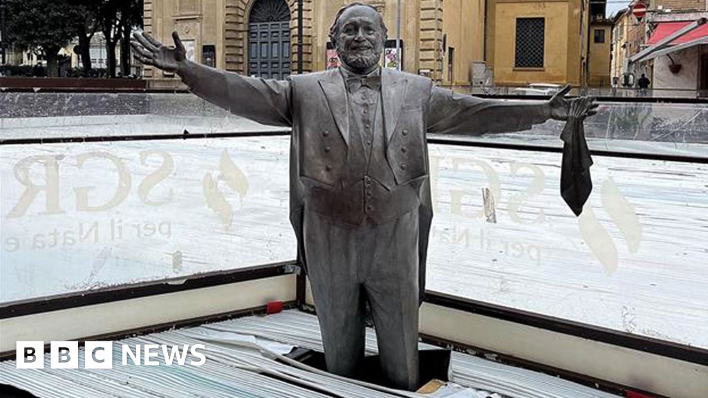 Italian town freezes Pavarotti statue knee-deep in Christmas ice rink, angering widow