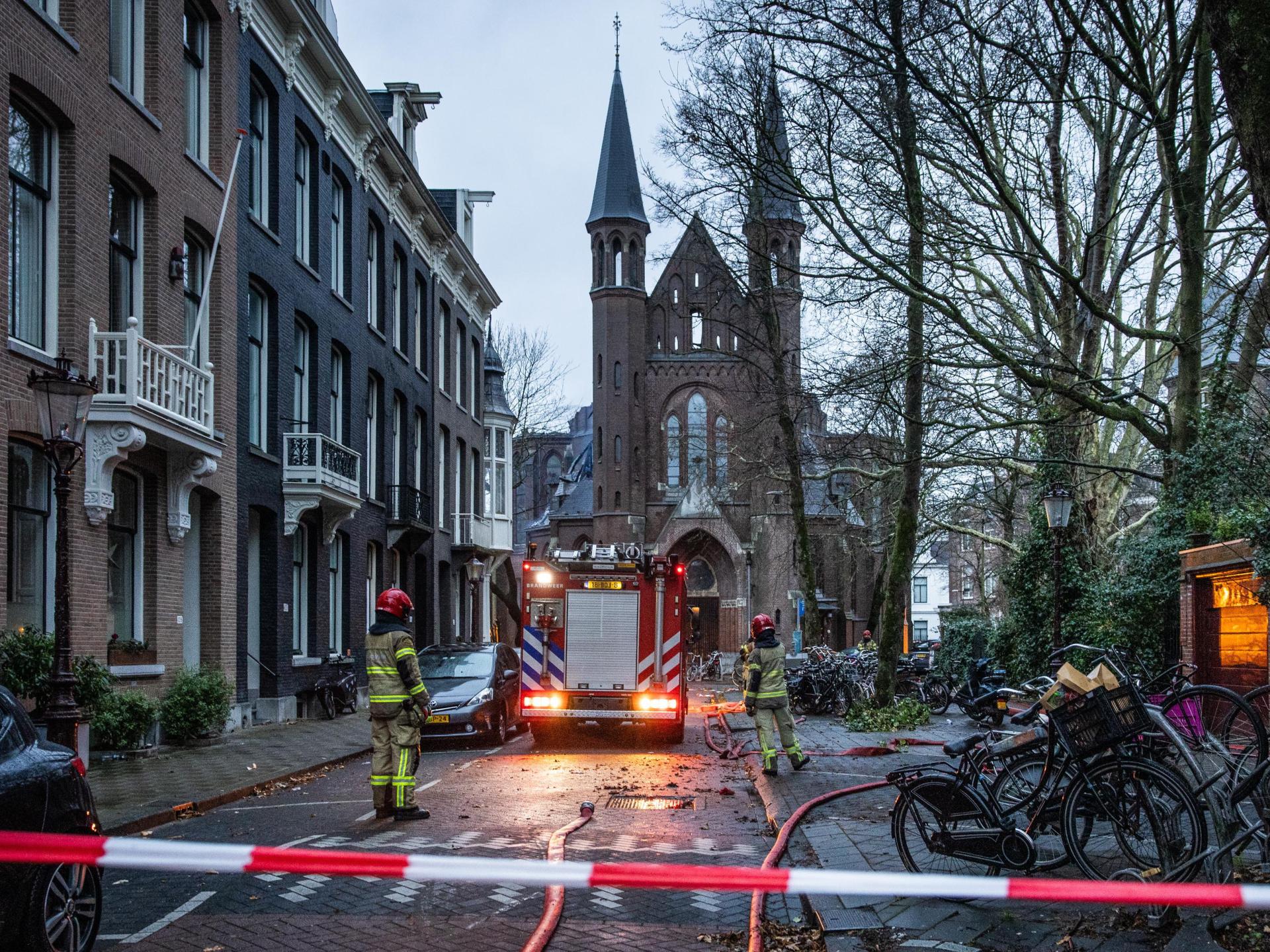 Firework accidents kill two in Netherlands as fire ravages Amsterdam church
