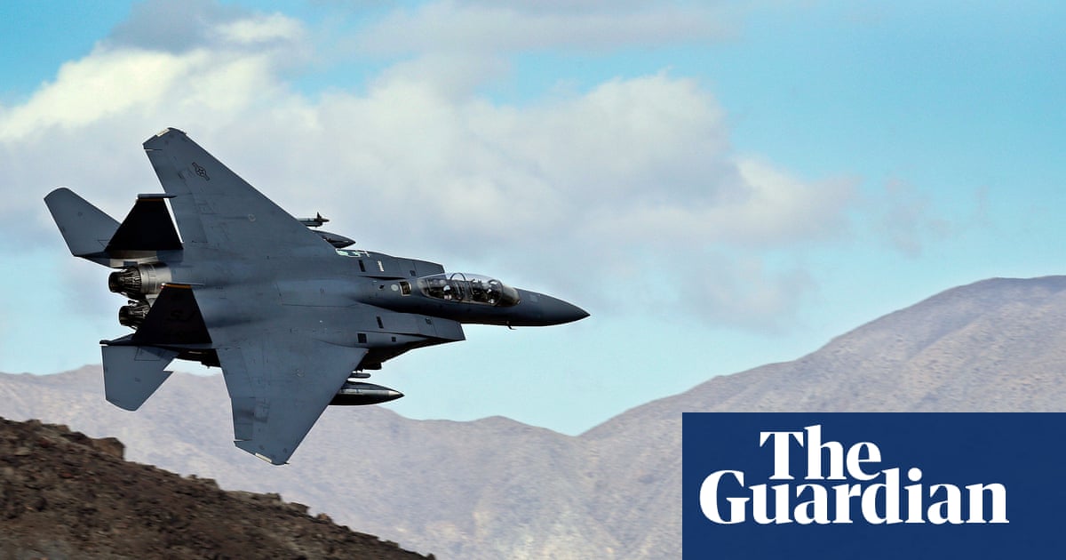 Search for missing US crew member of downed fighter jet enters second day