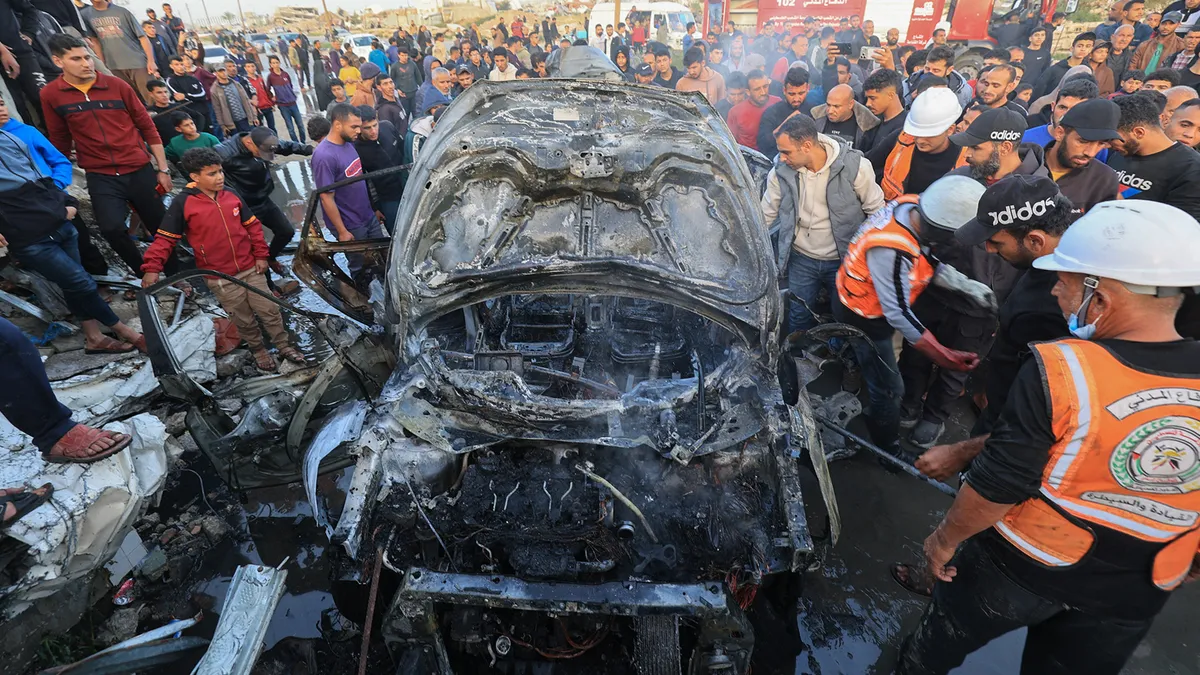 Vehicle engulfed in flames after Israeli drone strike in central Gaza