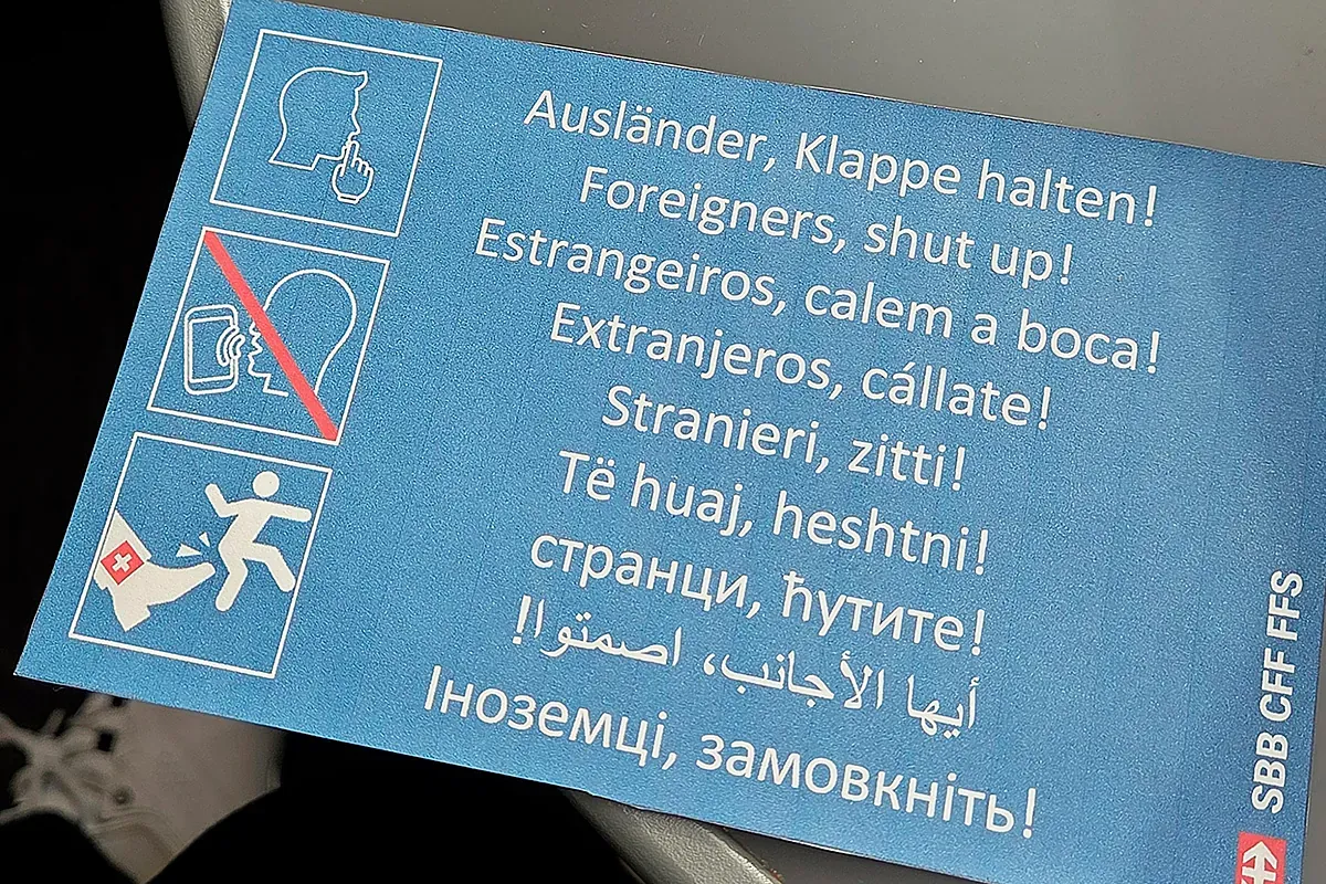 Tarjetas racistas contra los españoles en Suiza por hablar alto en el tren: "¡Extranjero, cállate!"