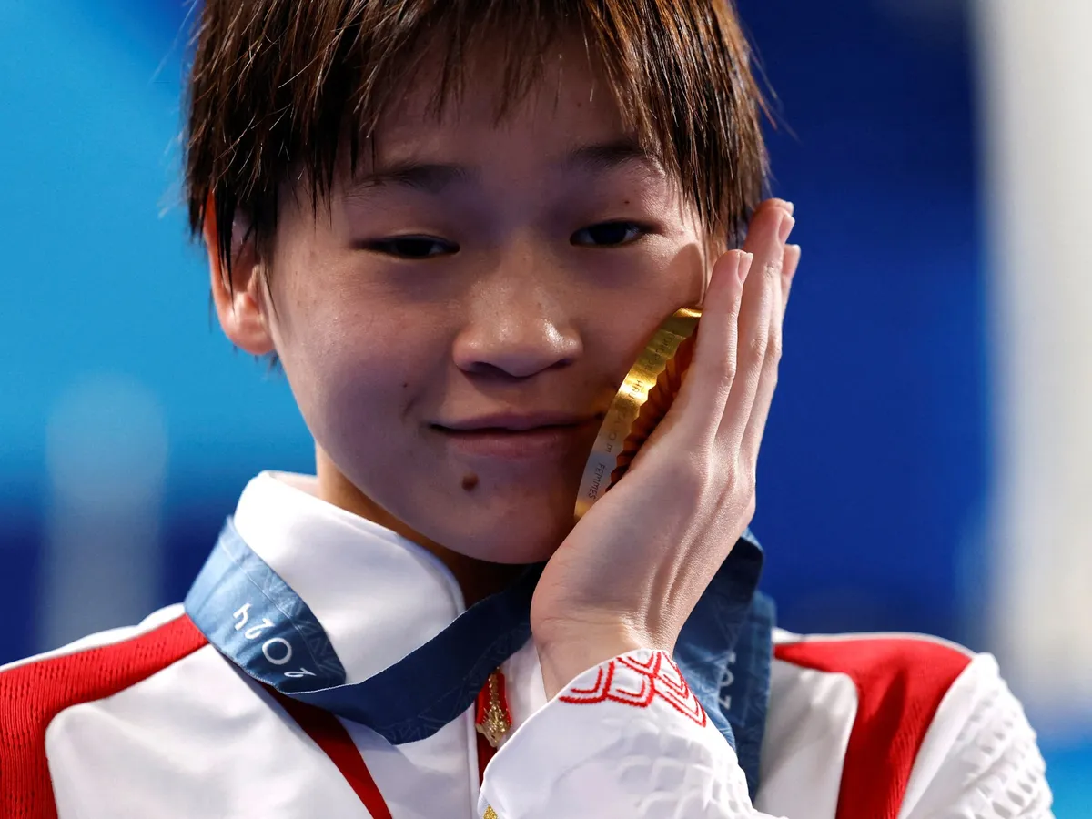 China probes ‘malicious’ cyberbullying of teen diving champion Quan