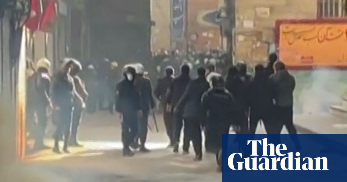 Iranian security forces clash with protesters at Tehran’s grand bazaar