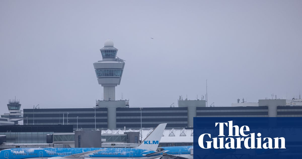Amsterdam airport cancels at least 700 flights because of snow and wind