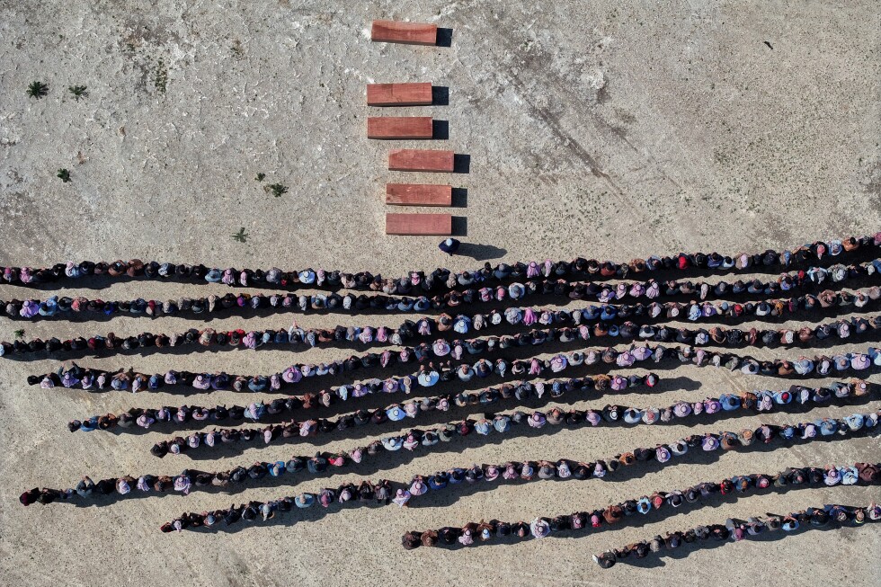 A Syrian man buries his wife and 4 children killed in Israeli strikes on Beirut