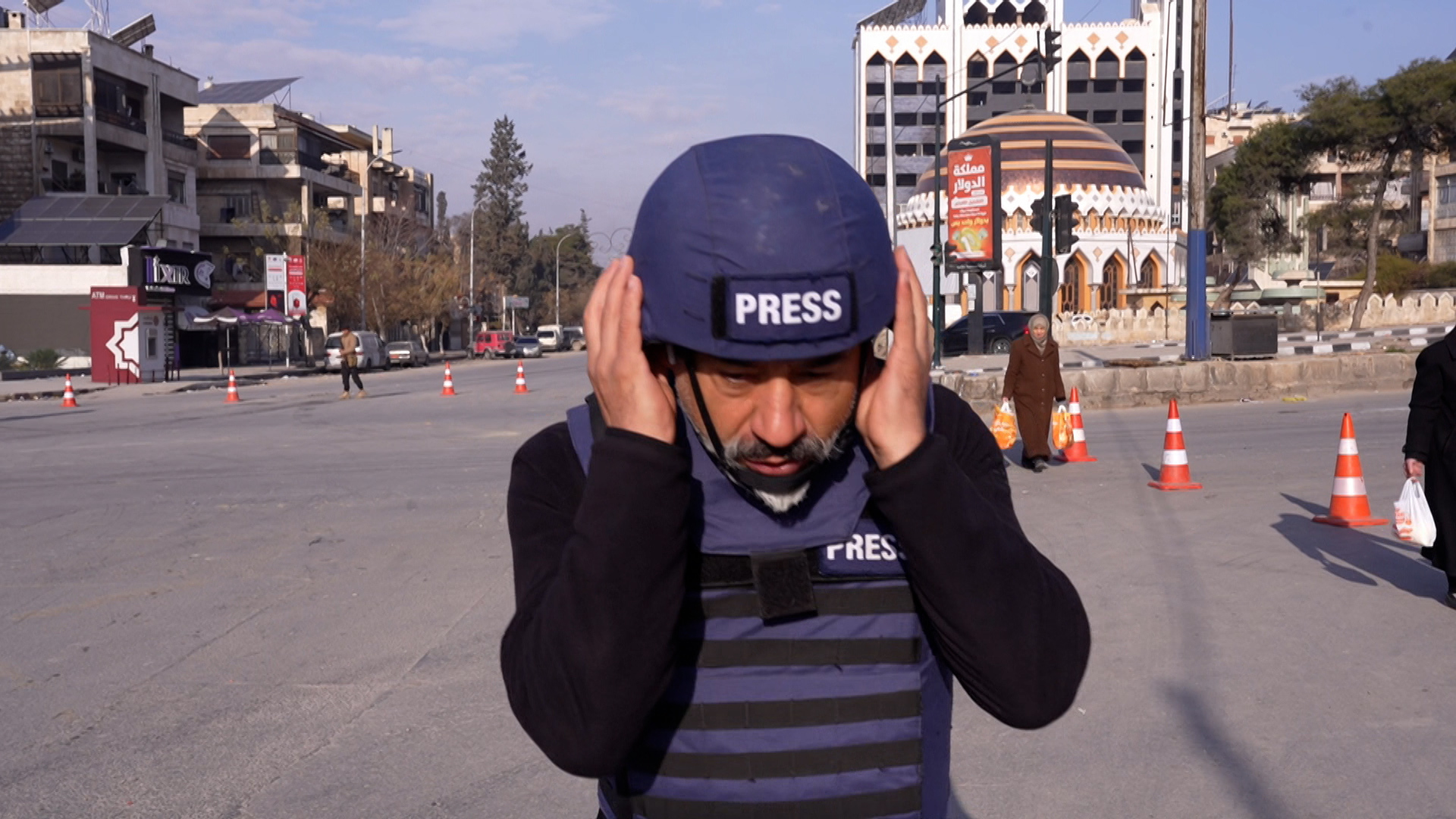 Al Jazeera reporter takes cover as shots ring out in Aleppo