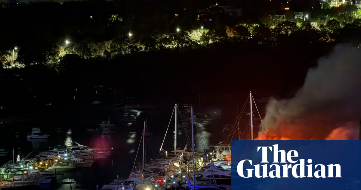 Three luxury yachts sink in Sydney Harbour as fire rips through exclusive Mosman marina