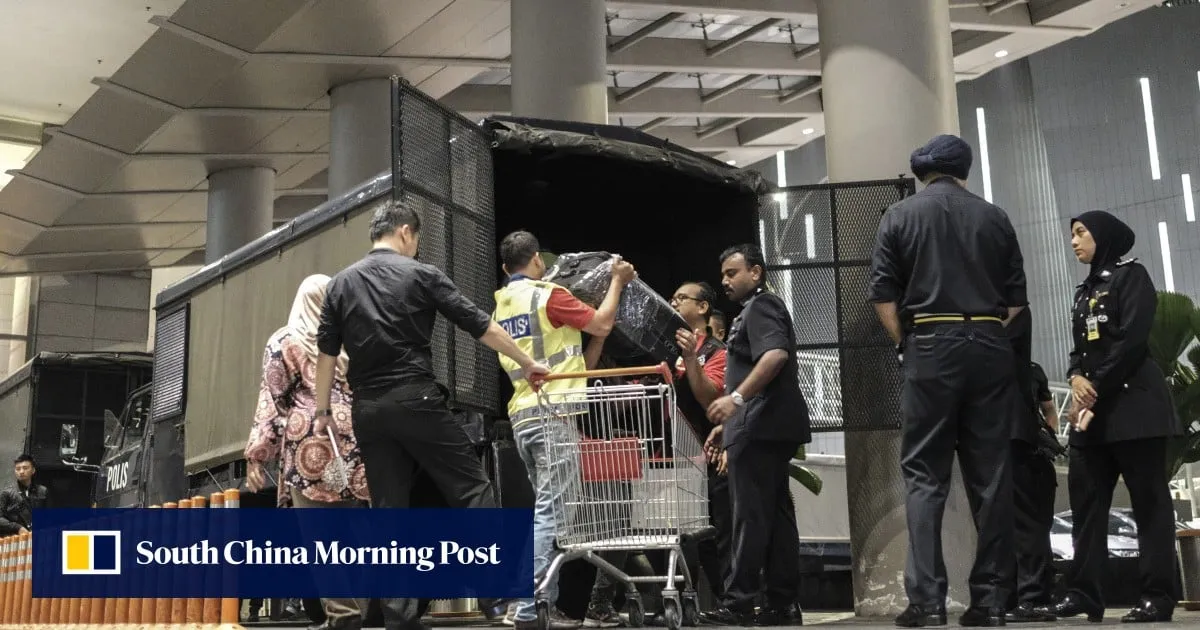 Malaysian police recall overflowing cash, gems in 1MDB raid on Najib-linked condo