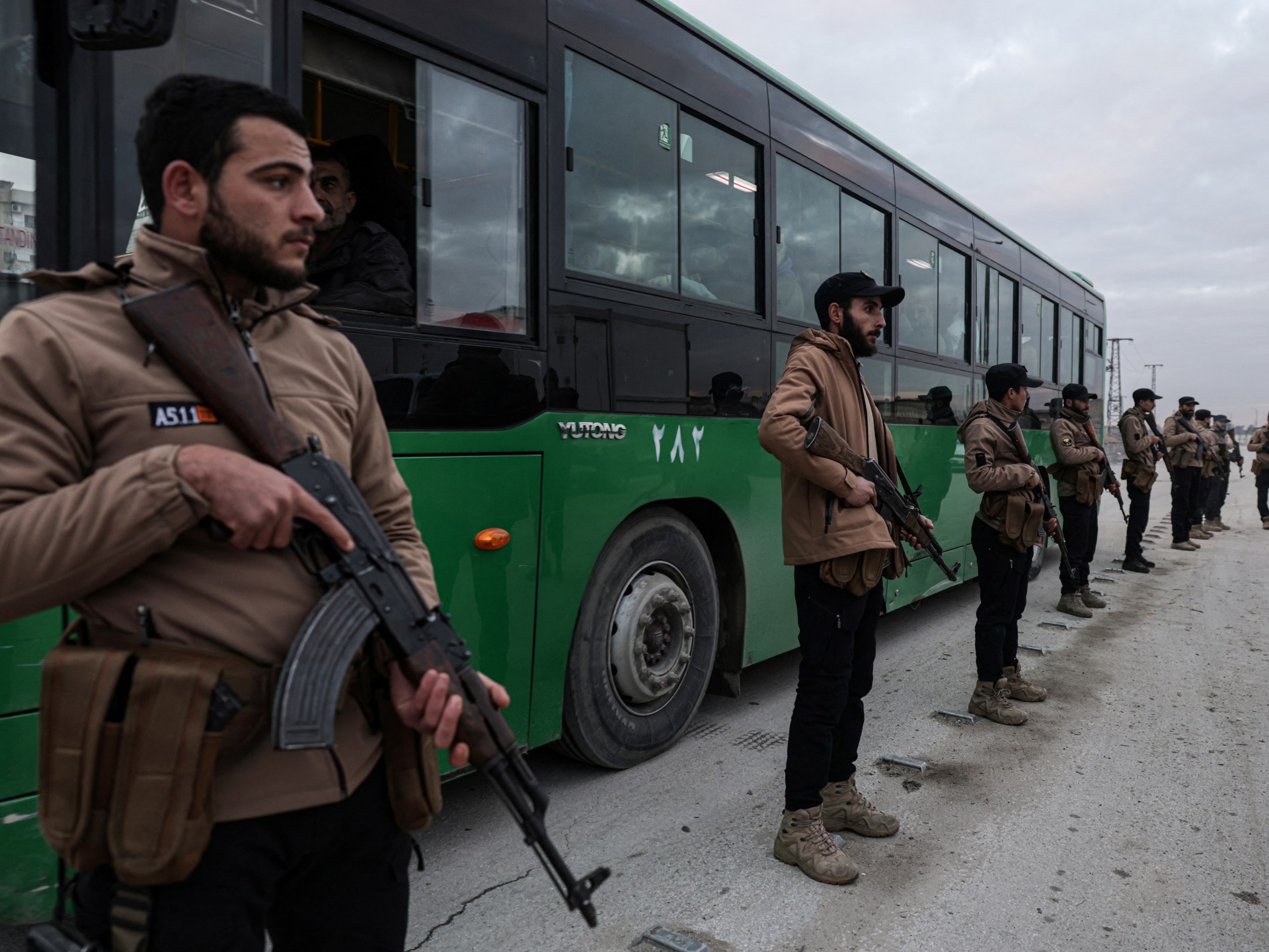 Syria live: SDF fighters pull out of Aleppo after deadly battles