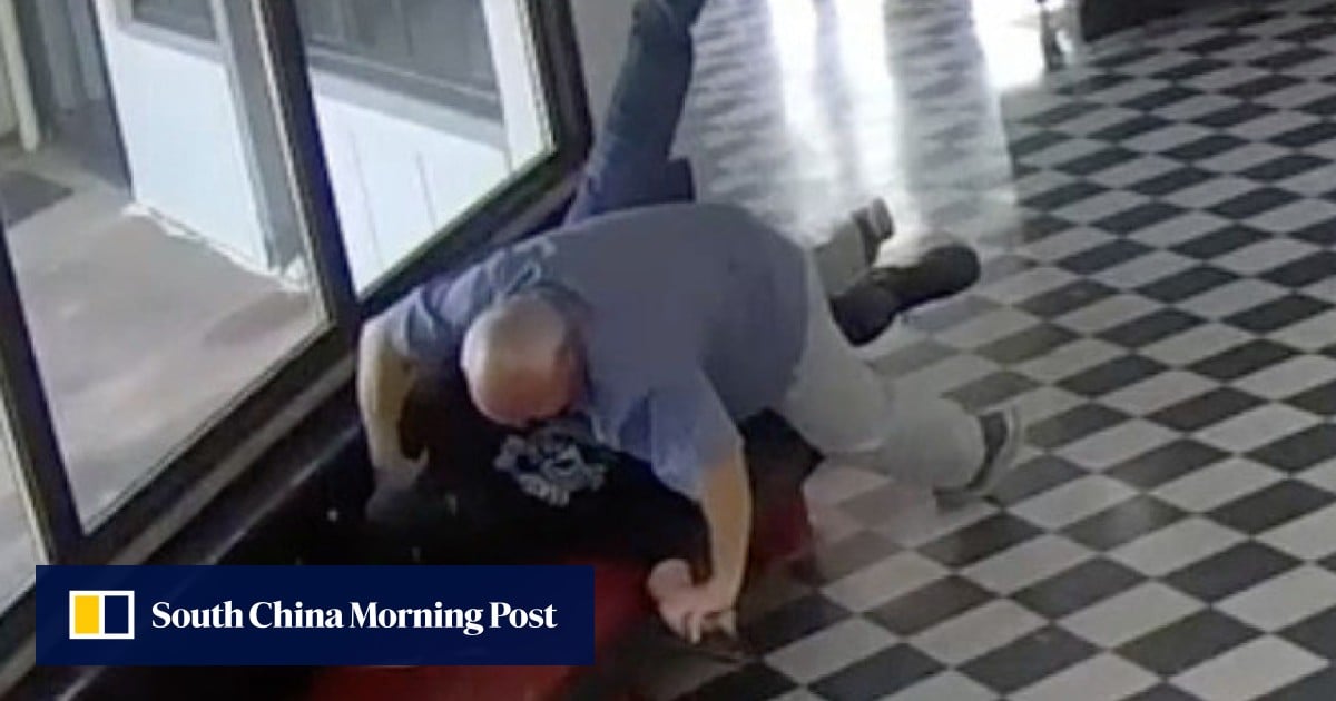 US high school principal tackles and disarms gunman as students flee, dramatic video shows