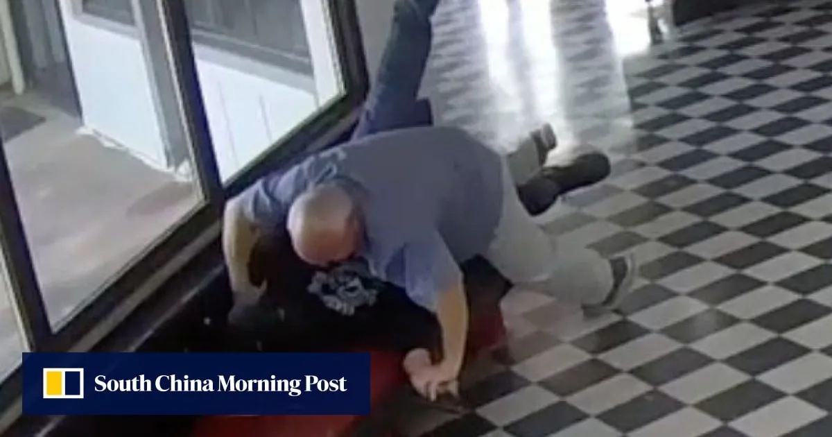 US high school principal tackles and disarms gunman as students flee, dramatic video shows
