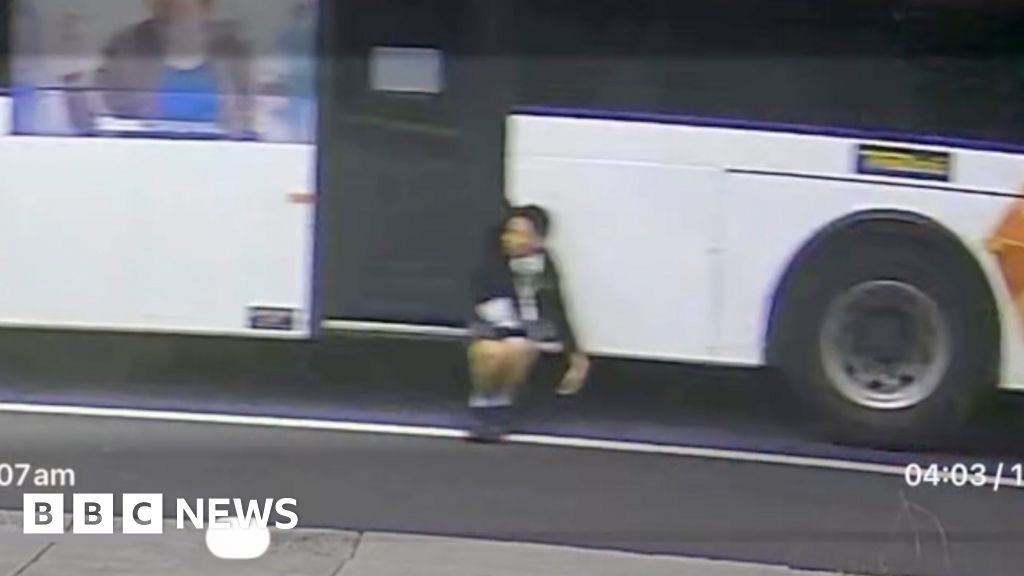 Watch: Trapped boy dangles from moving bus in Australia