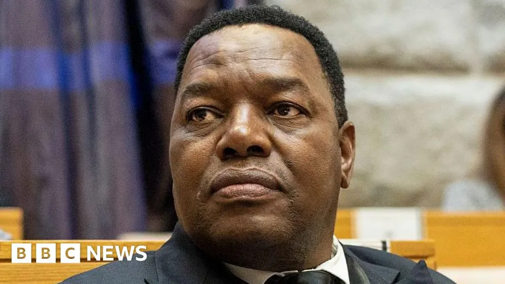 South Africa's police boss charged in connection with controversial health contract