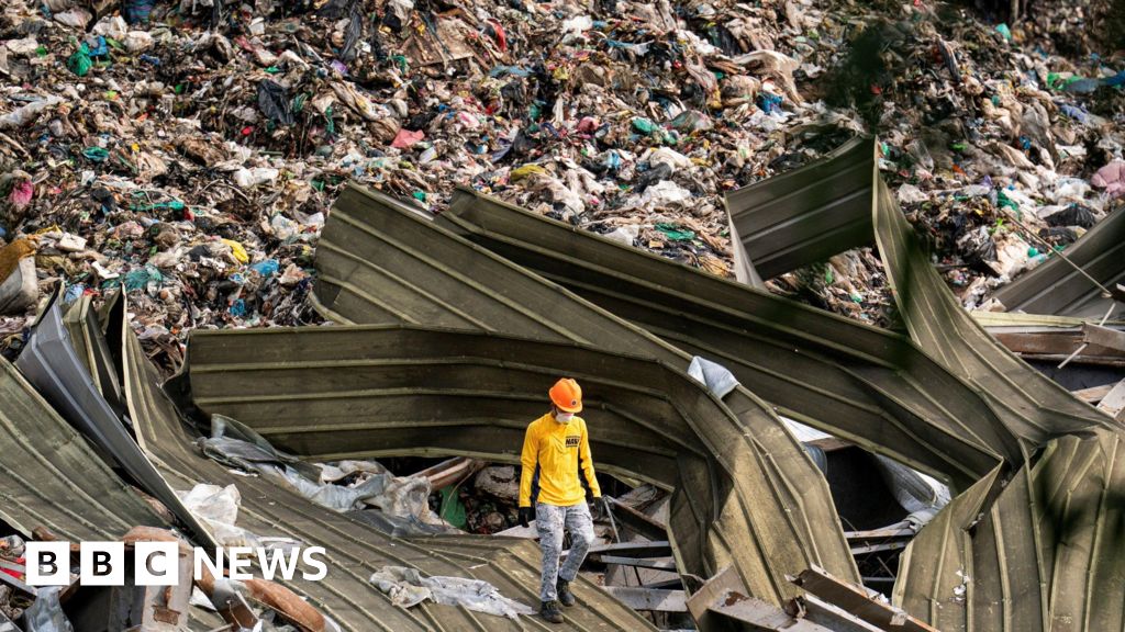Death toll in Philippines landfill collapse rises to 11