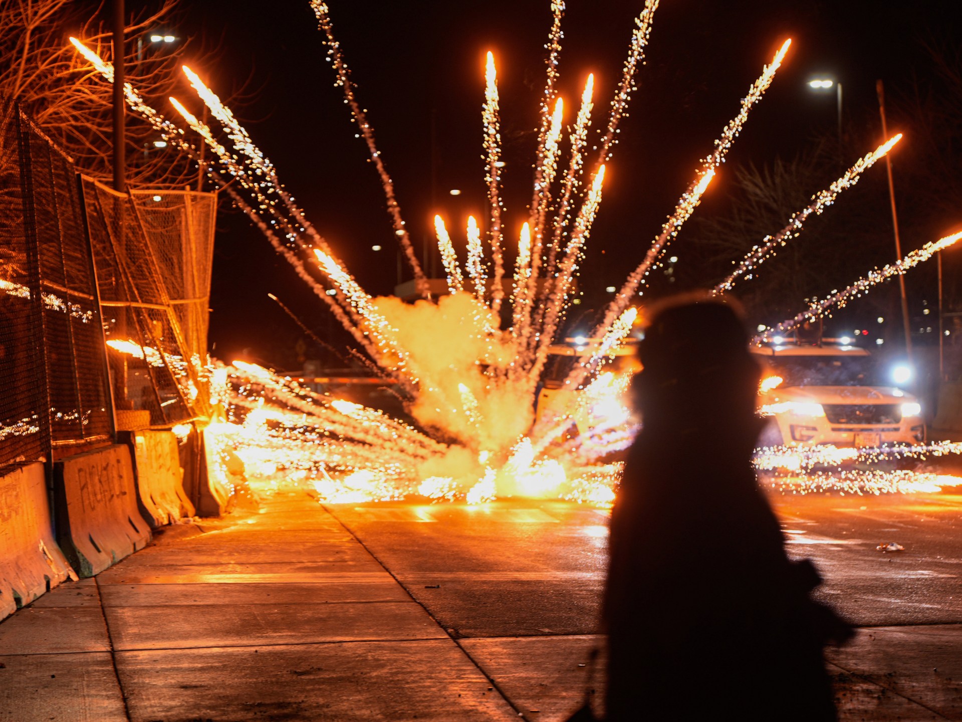 Tensions flare in Minnesota as protesters, federal agents square off