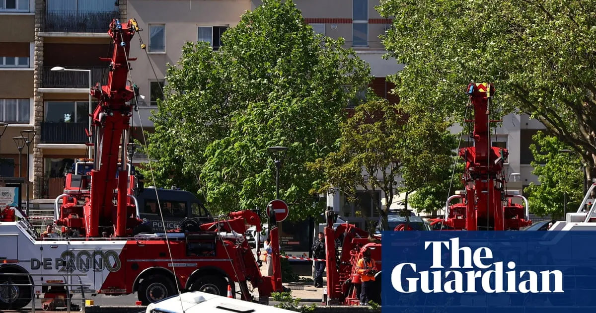 Four rescued from Seine after bus plunges into river near Paris