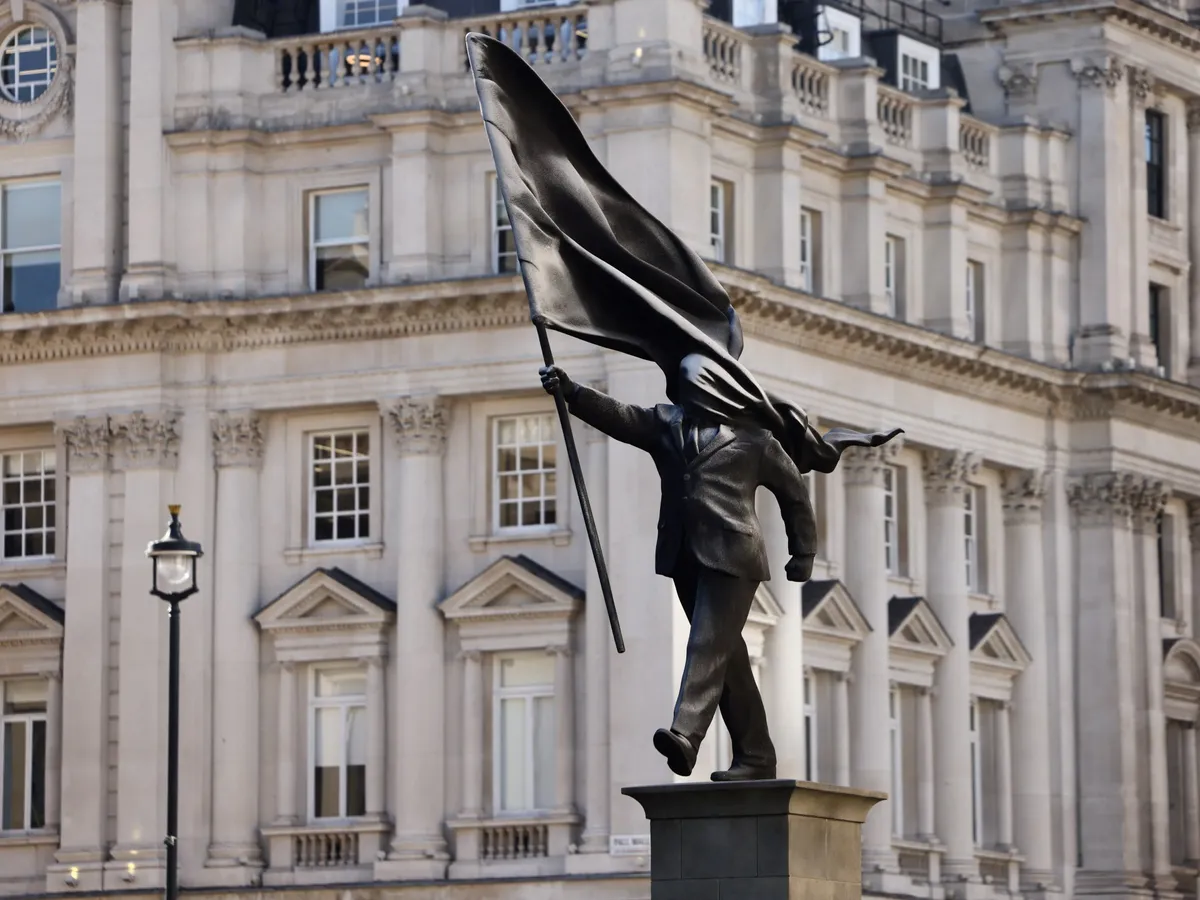New Banksy sculpture appears to show politician blinded by his own flag