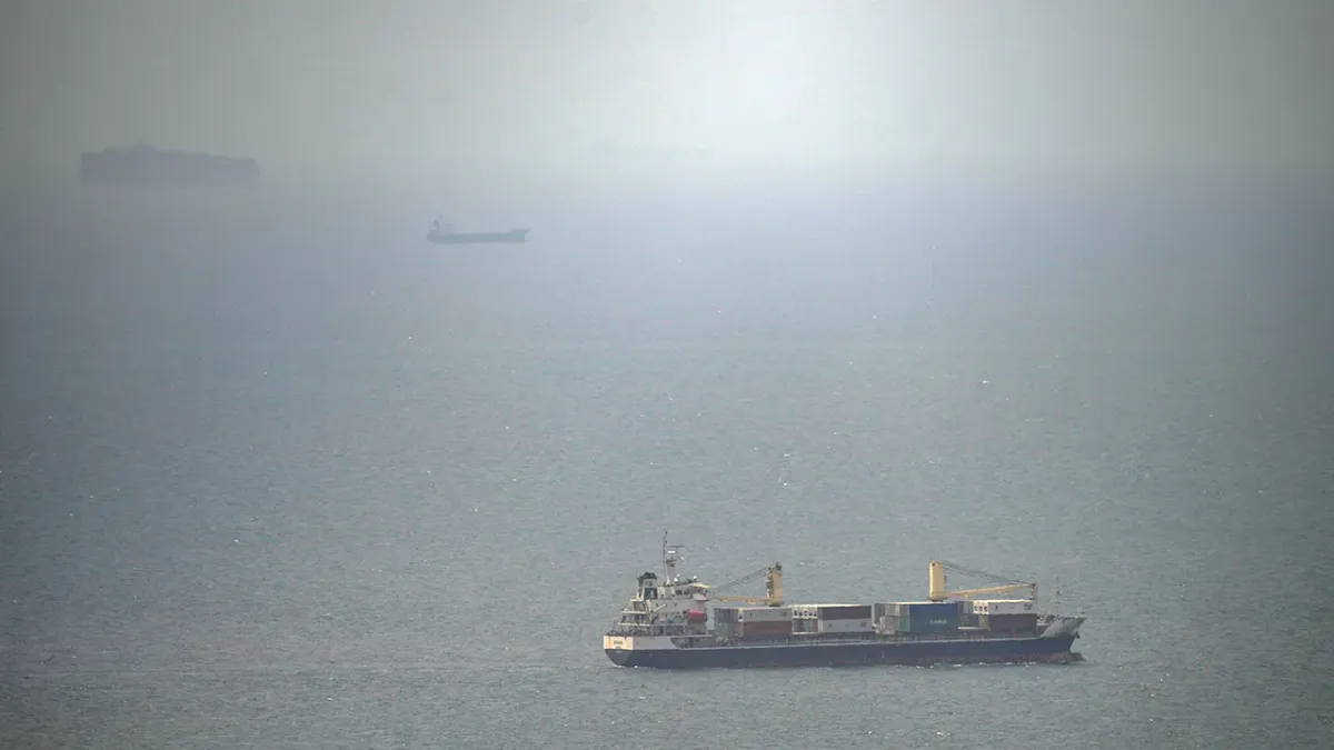 Cargo ship attacked by small craft near Strait of Hormuz, UK maritime agency says