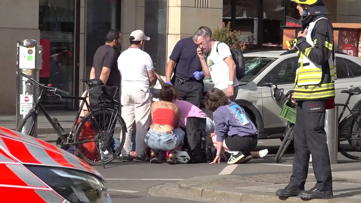 Car plows into pedestrian zone killing 2 as police detain driver and investigate motive