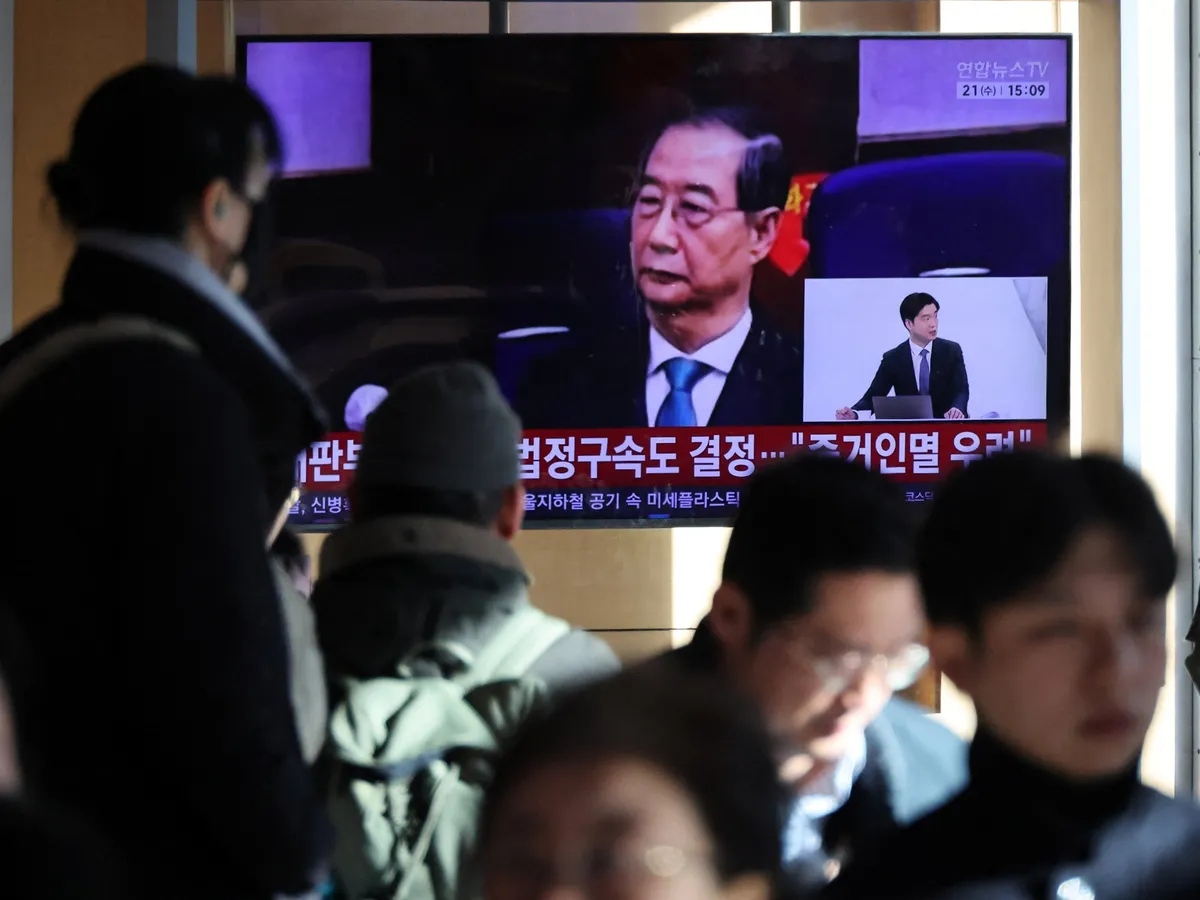 South Korean court reduces Han Duck-soo’s prison term in martial law case