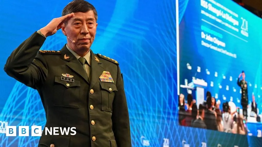 China announces suspended death sentences for former defence ministers
