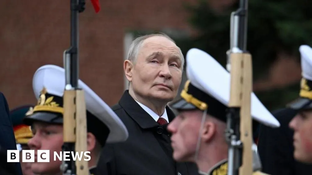 Putin denounces Nato at scaled back Victory Day parade