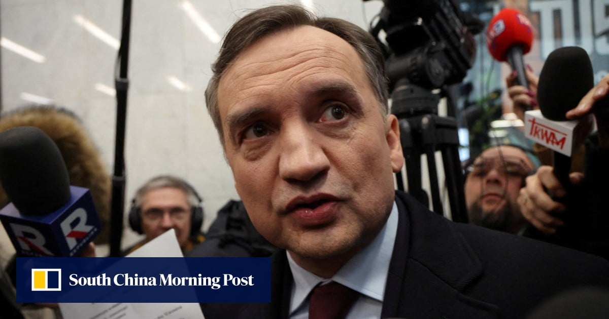 Poland’s ex-minister facing prosecution at home travels from Hungary to US