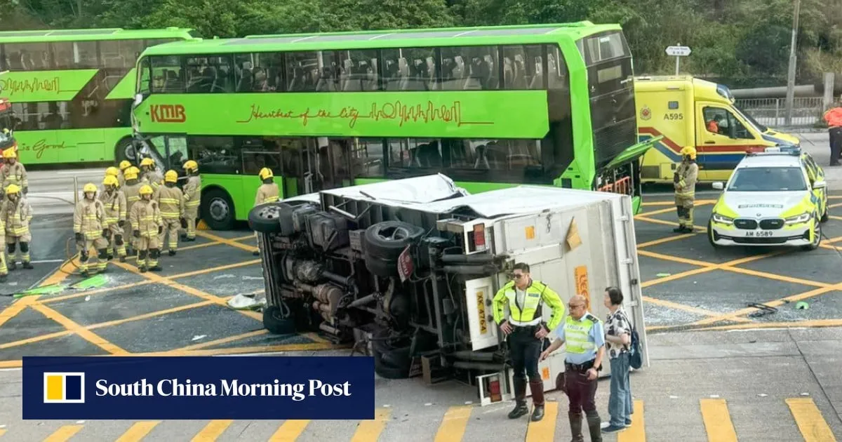 10 injured in truck-bus crash outside Hong Kong shopping centre
