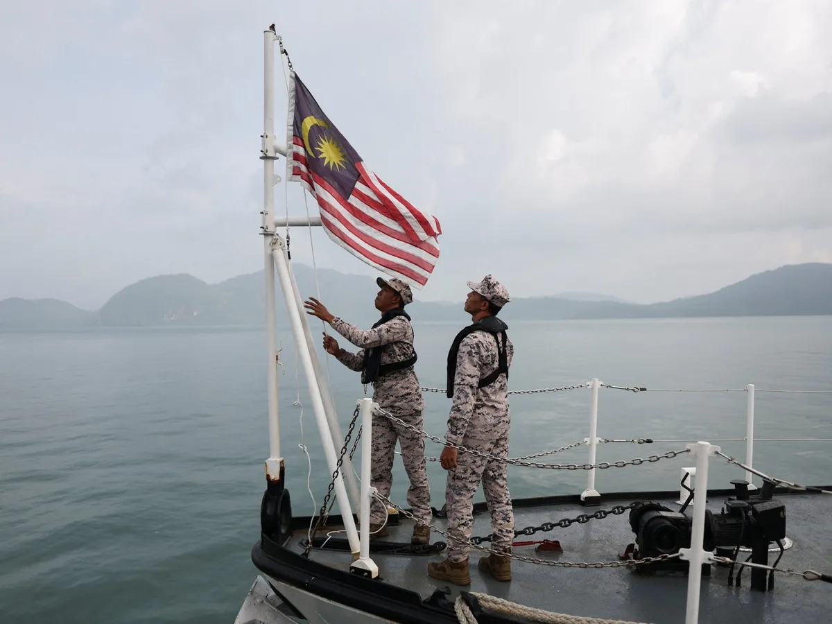 Malaysia rescues 23 migrants after boat capsizes, 14 still missing
