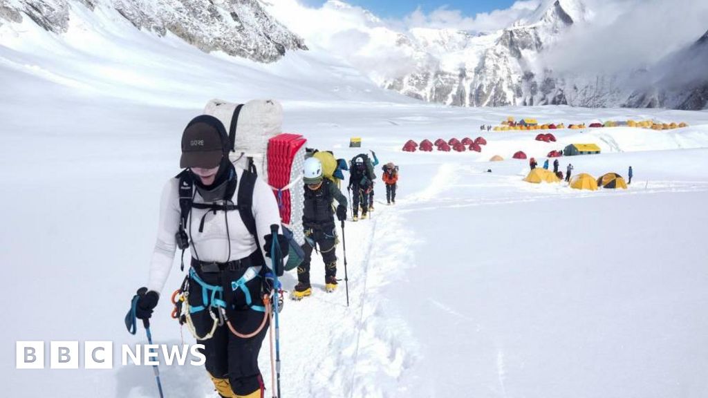 Climbers clear path to Everest summit past giant chunk of ice
