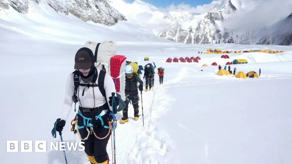 Climbers clear path to Everest summit past giant chunk of ice