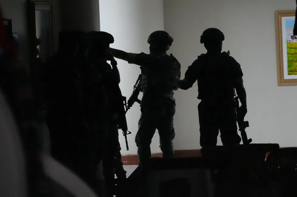 Gunfire breaks out in Philippine Senate where authorities have tried to arrest a senator