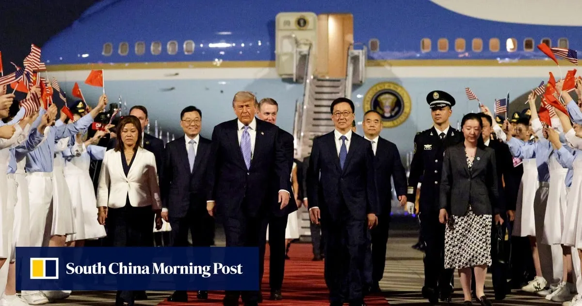 Trump arrives in China with tech titans and top aides for high-stakes Xi summit
