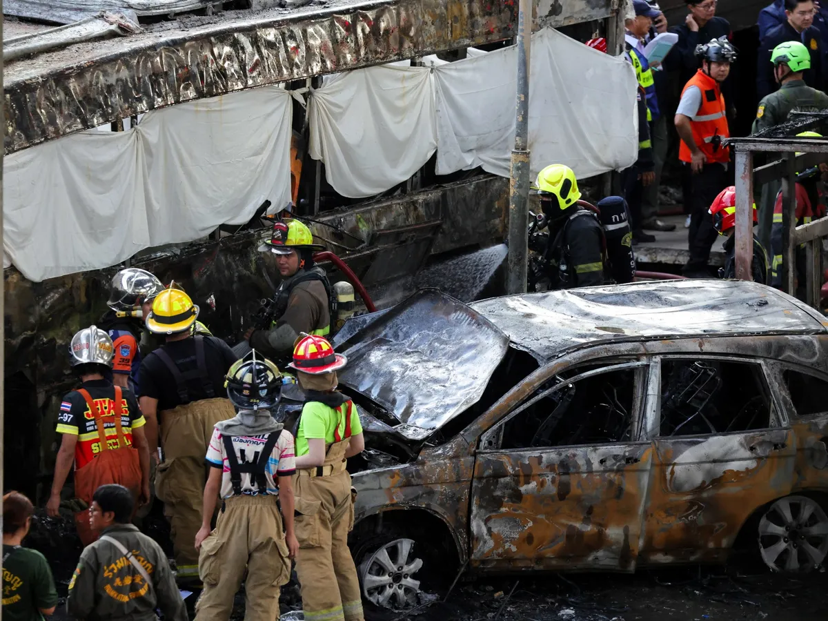 At least eight killed, 25 injured as train hits bus in Bangkok